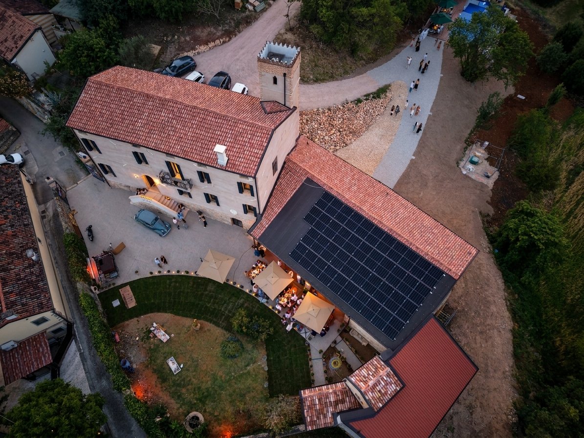 Aerial view of Tenuta Augusta's tower, courtyard and garden in Mossano