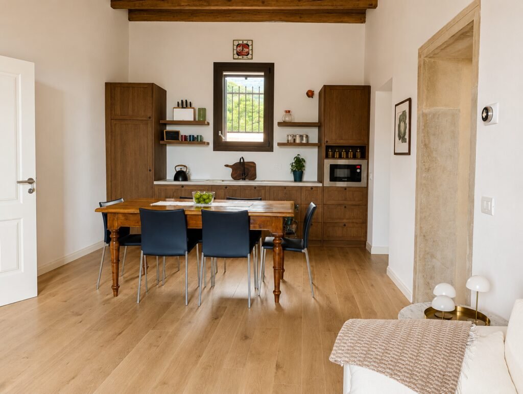 La Colombara apartment kitchen and dining area in walnut