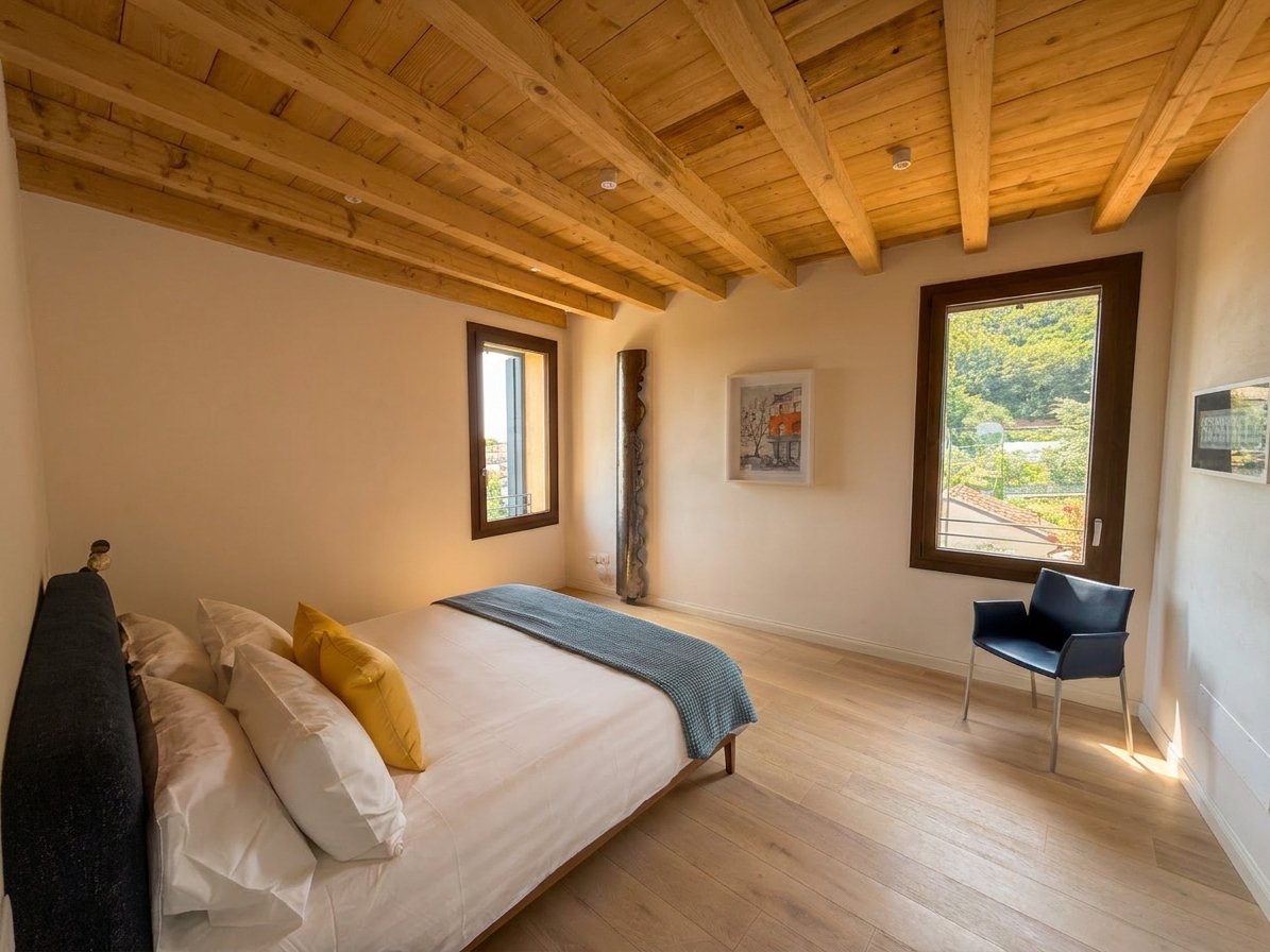 Moderna suite, a contemporary bedroom with steel fixtures and countryside views