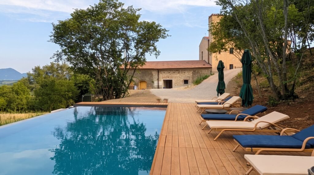 Tenuta Augusta pool and garden at dusk
